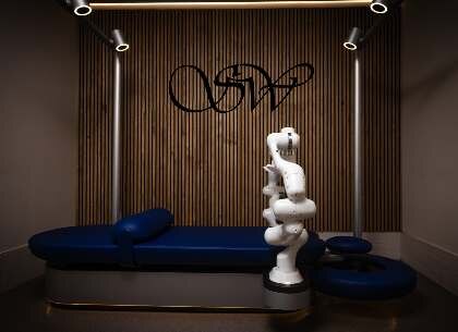 Aescape table — second view, OSW monogram on walnut